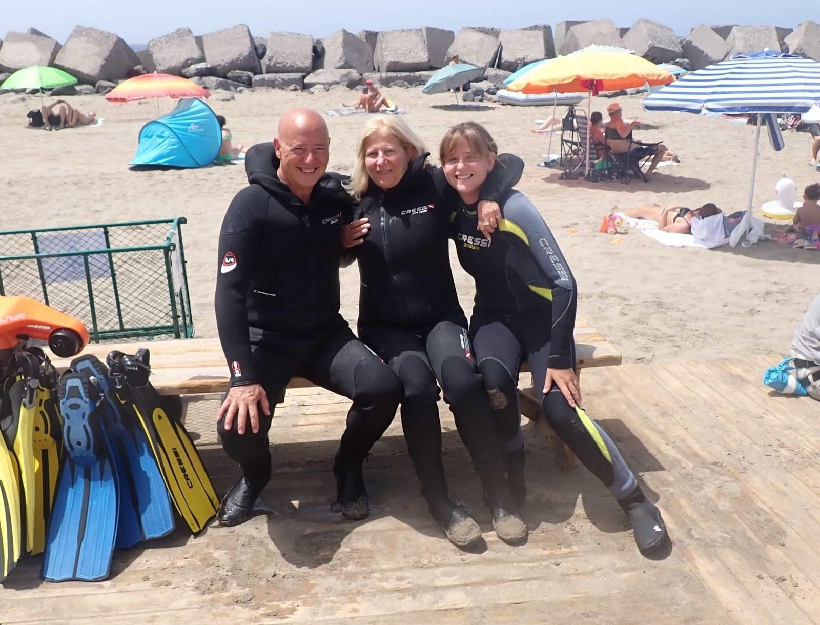 Discover Scuba Diving participants smiling after a shore dive experience with full scuba gear
