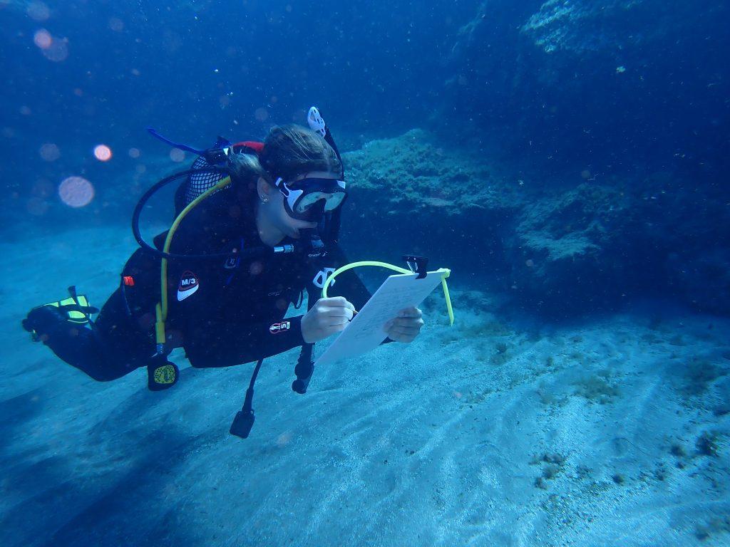 PADI Advanced Open Water Diver practicing underwater navigation skills during training dive